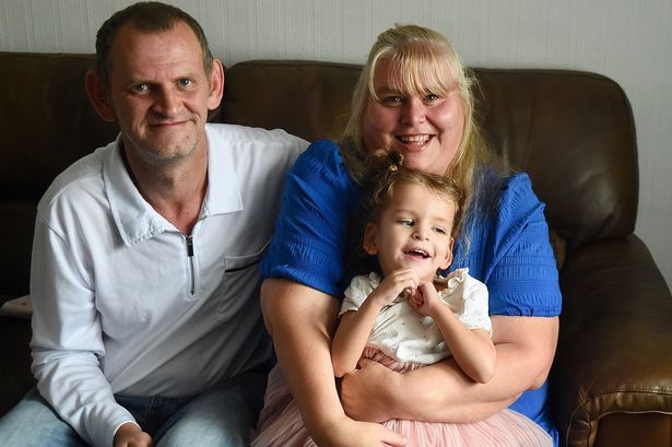 Parents Brian MacFarlane and Margaret Wilson with young Eireann, whom they care for 24 hours a day