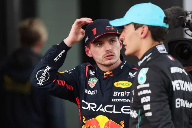 Max Verstappen of the Netherlands and Oracle Red Bull Racing talks with Third placed George Russell of Great Britain driving the (63) Mercedes AMG Petronas F1 Team W14 in parc ferme during the F1 Grand Prix of Spain at Circuit de Barcelona-Catalunya