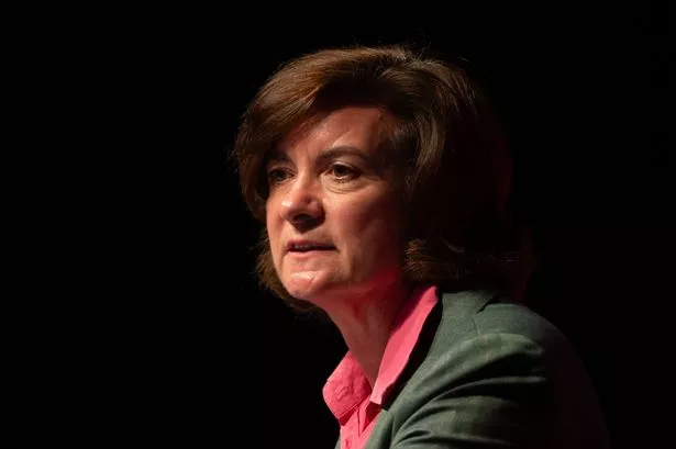 First Minister of Wales Eluned Morgan in a pink shirt