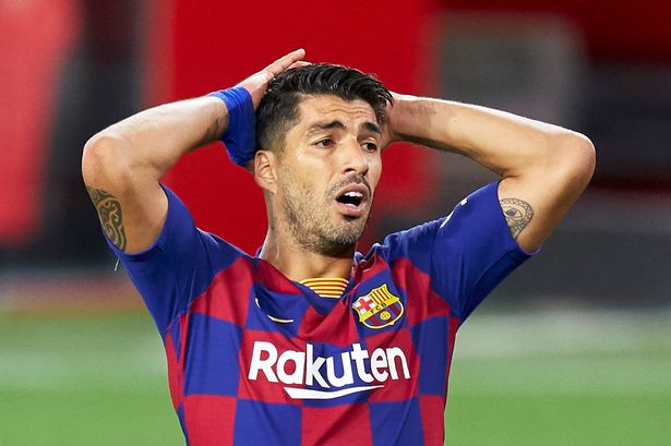 Luis Suarez of FC Barcelona reacts during the Liga match between Sevilla FC and FC Barcelona at Estadio Ramon Sanchez Pizjuan on June 19, 2020 in Seville, Spain. 
