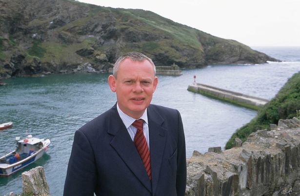 Actor Martin Clunes in character as Dr. Martin Ellingham while filming comedy drama series Doc Martin in Port Isaac, Cornwall, circa 2006