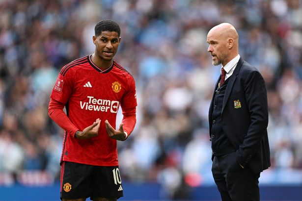 Manchester United winger Marcus Rashford in conversation with his former manager Erik ten Hag