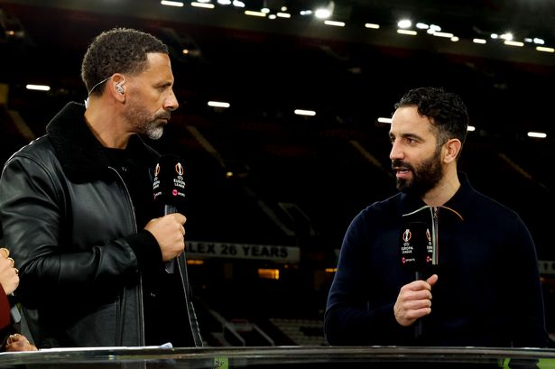 Rio Ferdinand pictured in conversation with Manchester United head coach Ruben Amorim last season