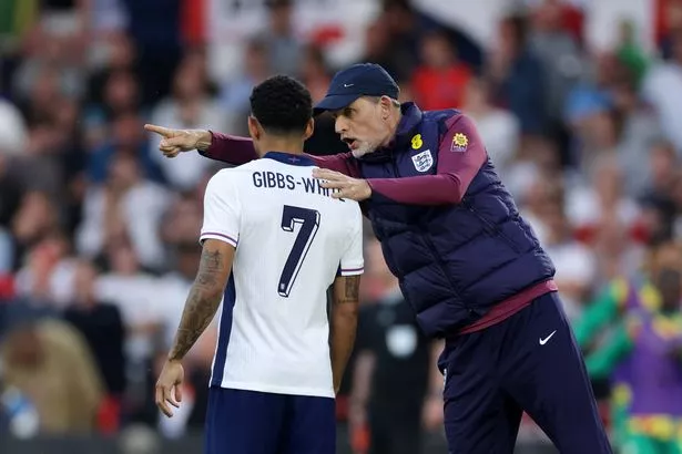 Thomas Tuchel, Head Coach of England, talks to Morgan Gibbs-White of England during the international friendly match between England and Senegal at City Ground on June 10, 2025 in Nottingham, England