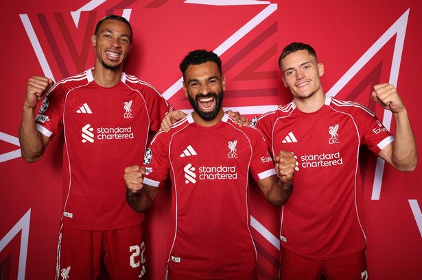 Hugo Ekitike, Mohamed Salah and Florian Wirtz of Liverpool FC pose for a portrait during the official UEFA Champions League 2025/26 portrait session 