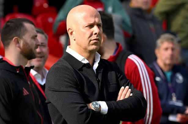 Arne Slot, Manager of Liverpool, looks on prior to the Premier League match between Liverpool and Arsenal at Anfield on August 31, 2025 in Liverpool, England