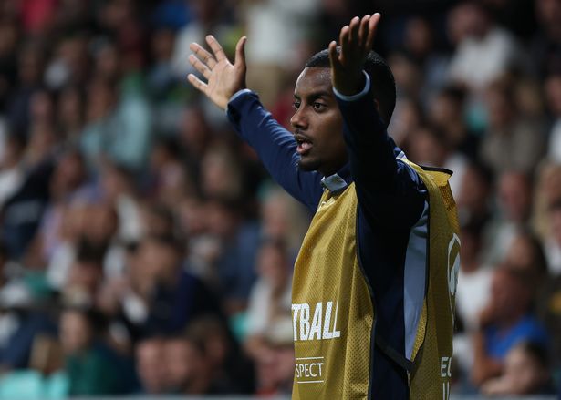 Alexander Isak of Sweden reacts as he looks on from the substitute's bench