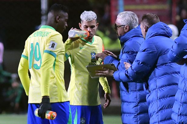 Brazil head coach Carlo Ancelotti talks to Bruno Guimaraes during the defeat to Bolivia