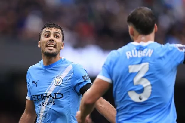 Rodri of Manchester City gestures during the Premier League match between Manchester City and Manchester United at Etihad Stadium