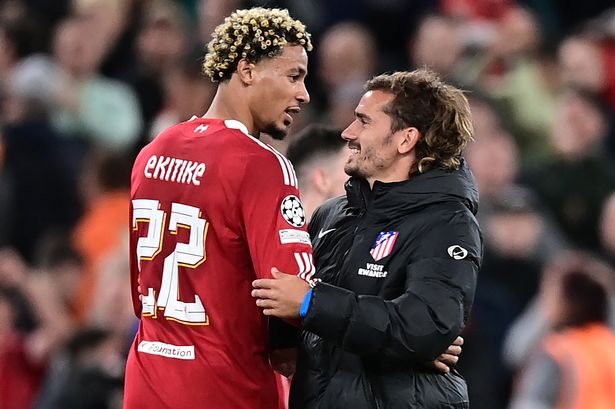 Liverpool's Hugo Ekitike reacts to Atletico Madrid's Antoine Griezmann. 