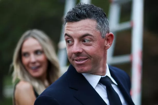 Rory McIlroy of Team Europe and wife Erica Stoll McIlroy arrive for the Ryder Cup Teams' Welcome Dinner prior to the Ryder Cup 2025 at Hempstead House on September 23, 2025 in Sands Point, New York.
