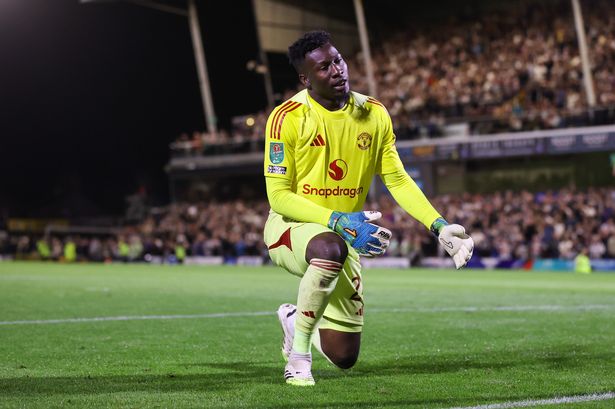 Andre Onana reacts during the Carabao Cup Second Round match between Grimsby Town and Manchester United at Blundell Park. 