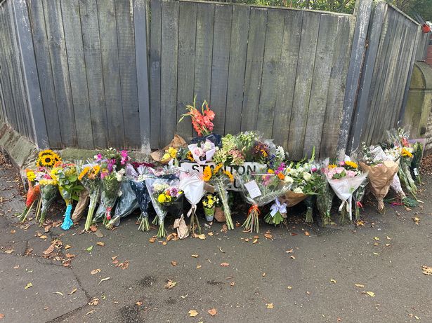 Flowers left for Jen at the scene
