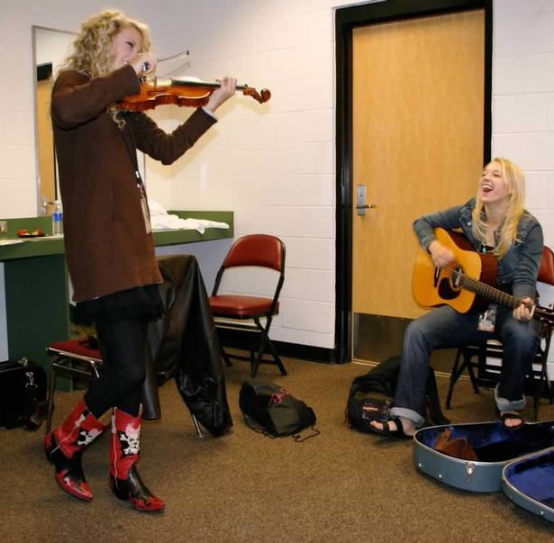 Emily, right, jamming with the then-teenage Taylor Swift during the early years of Taylor's career