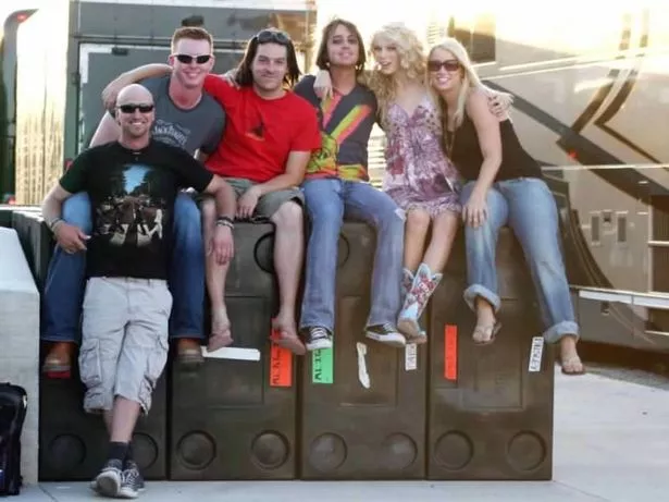 Emily, right, with Taylor and the rest of the band