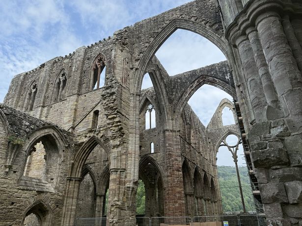 The view from the end of the nave towards the north and south transepts at Tintern Abbey, Wye Valley, Monmouthshire, Wales