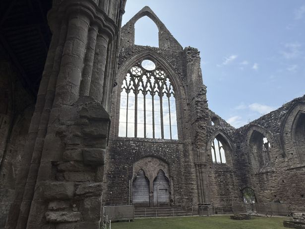 Looking back towards the magnificent entrance of Tintern Abbey, Wye Valley, Monmouthshire, Wales