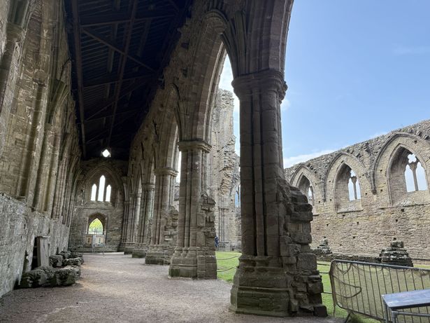 Looking from the south transept down the south aisle at Tintern Abbey, Wye Valley, Monmouthshire, Wales