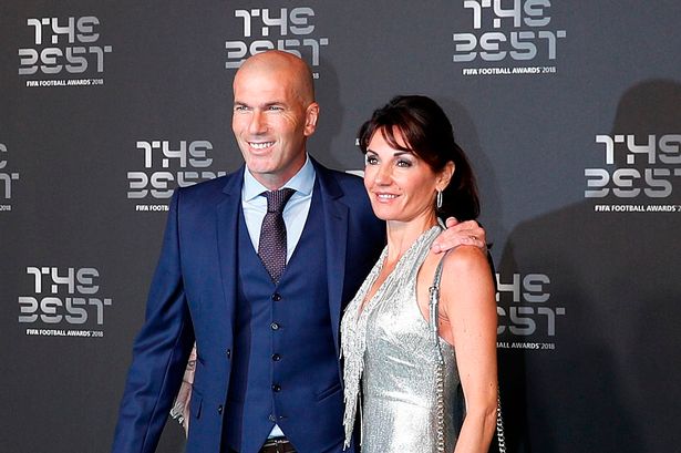 Real Madrid's French coach Zinedine Zidane and his wife Veronique arrive for The Best FIFA Football Awards ceremony, on September 24, 2018 in London. 
