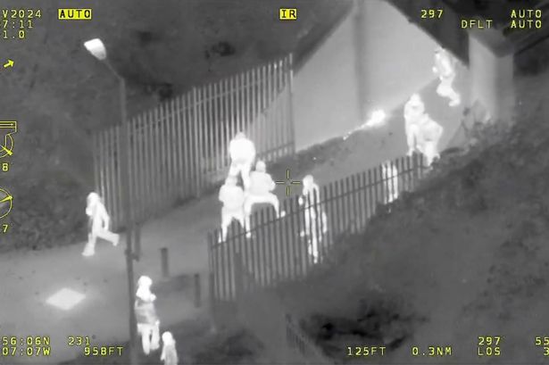 Helicopter footage showed youths throwing fireworks 