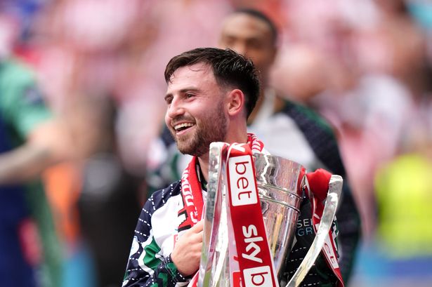 Patrick Roberts celebrates with the trophy after Sunderland's play-off final victory