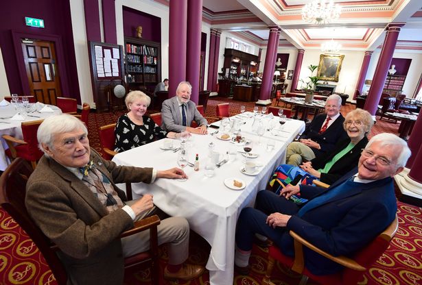 Members having lunch at The Athenaeum Club at the open table - a table any member can join to get to know others
