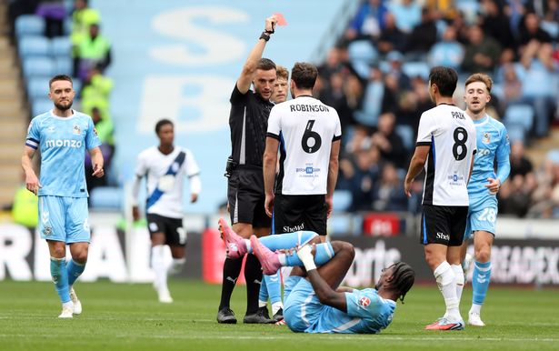 Jack Robinson is shown a red card