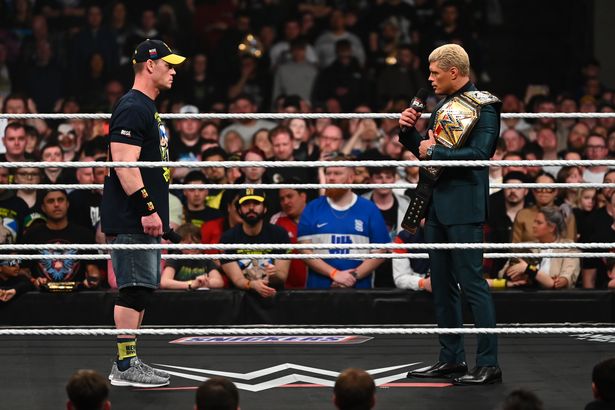 A picture of John Cena and Cody Rhodes facing off during Monday Night RAW at The OVO Hydro on March 24, 2025 in Glasgow