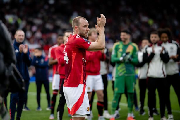 Christian Eriksen of Manchester United applauds the fans