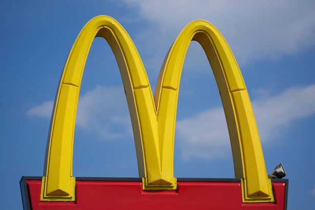 A McDonald's logo is shown at a restaurant 