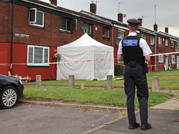 Merseyside Police scene at South John Street, St Helens after an elderly couple died following an arson attack