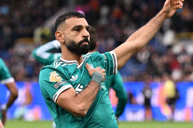 Mohamed Salah celebrates after scoring for Liverpool against Burnley