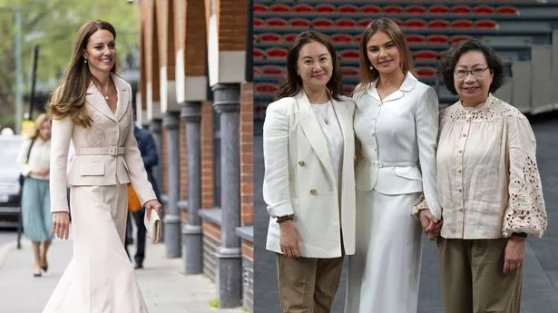Kate Middleton in a cream skirt suit (left) and Alina Kabaeva also in a cream skirt suit (right)