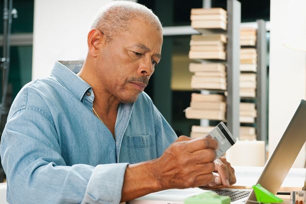 A man checks his finances