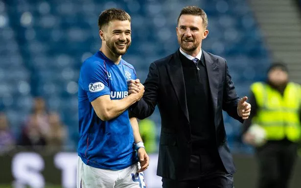 Rangers' Nicolas Raskin (L) and Interim Head Coach Barry Ferguson 