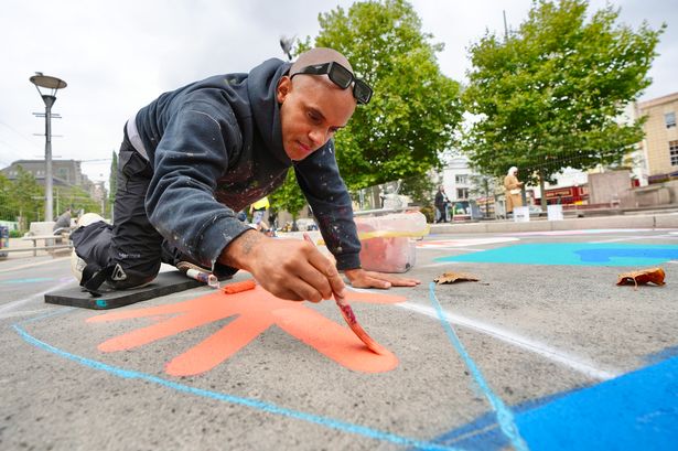 The creation of 'Our Common Ground', a brand new artwork by multidisciplinary artist Oshii drawing on African heritage, world history and present-day community voices, on the ground of The Centre in Bristol