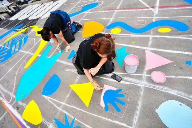 The creation of 'Our Common Ground', a brand new artwork by multidisciplinary artist Oshii drawing on African heritage, world history and present-day community voices, on the ground of The Centre in Bristol