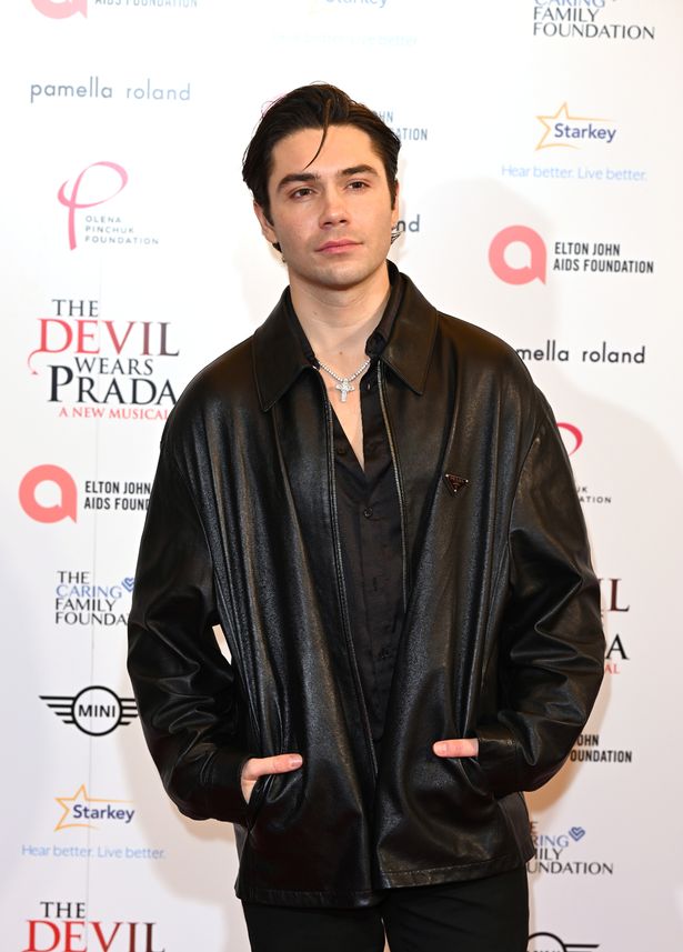 George Shelley in a leather jacket