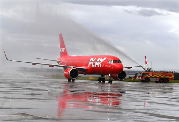 The PLAY inaugural flight arrives at Liverpool John Lennon Airport, greeted by a water arch from Firefighters
