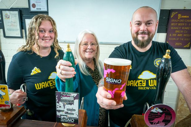Councillor Sue Smith with Leanne and Anthony Jones at the Wakey Wakey Brew Company in Rochdale