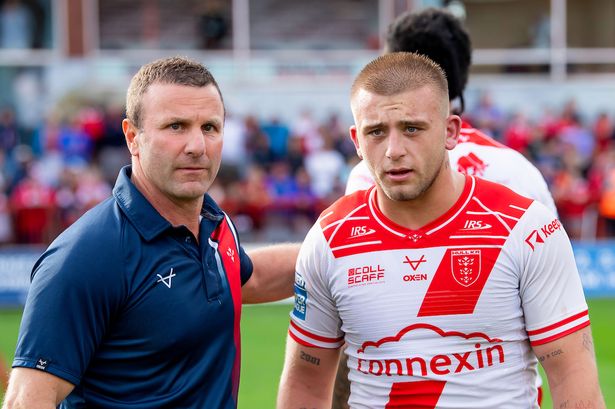 Hull KR's coach Willie Peters and Mikey Lewis after victory over Hull FC.