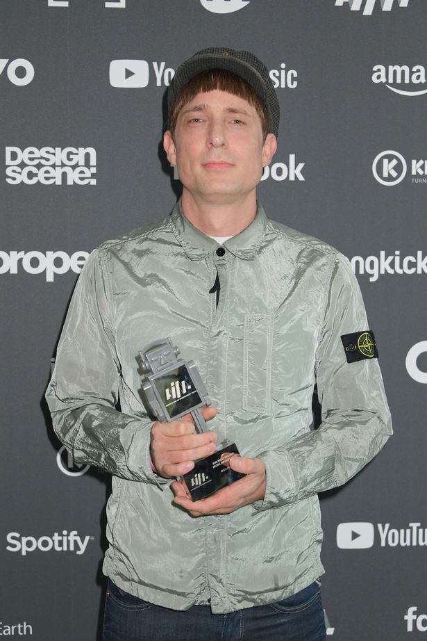 Gerry Cinnamon attends the Association of Independent Music Awards 2019 in London, holding an award