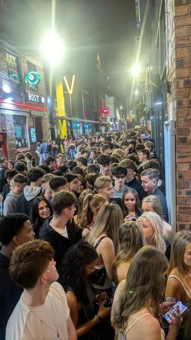 The queue to get in stretches down the street