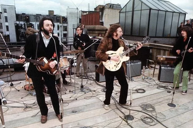 The Beatles perform on the rooftop of the Apple offices at Savile Row, London.