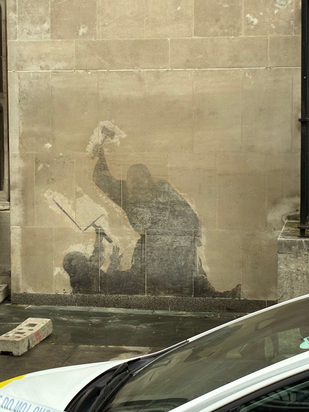 The mural depicts a court judge hitting a protester with a gavel. Banksy, a Bristol-based street artist, confirmed the artwork was one of his own