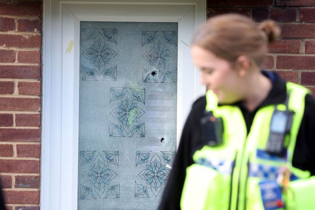 Police at the scene of an alleged shooting at a property, Maes Glas, Kenfig Hill, Bridgend
