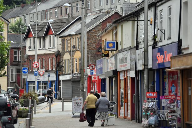 A generic shot of the high street with people shopping in the distance on a quiet day in the town centre