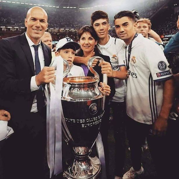 Zinedine Zidane, his wife Veronique and their children celebrate with the Champions League trophy