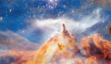 New Webb image shows star formation as glittering, craggy peaks