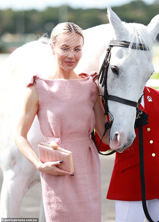 She was also joined by influencer Saskia (pictured), who put on a stunning display in an elegant light pink frock